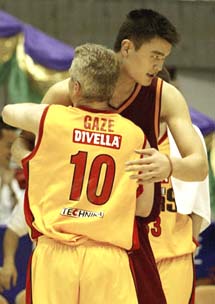 Australian Legend Andrew Gaze greets Yao Ming of China